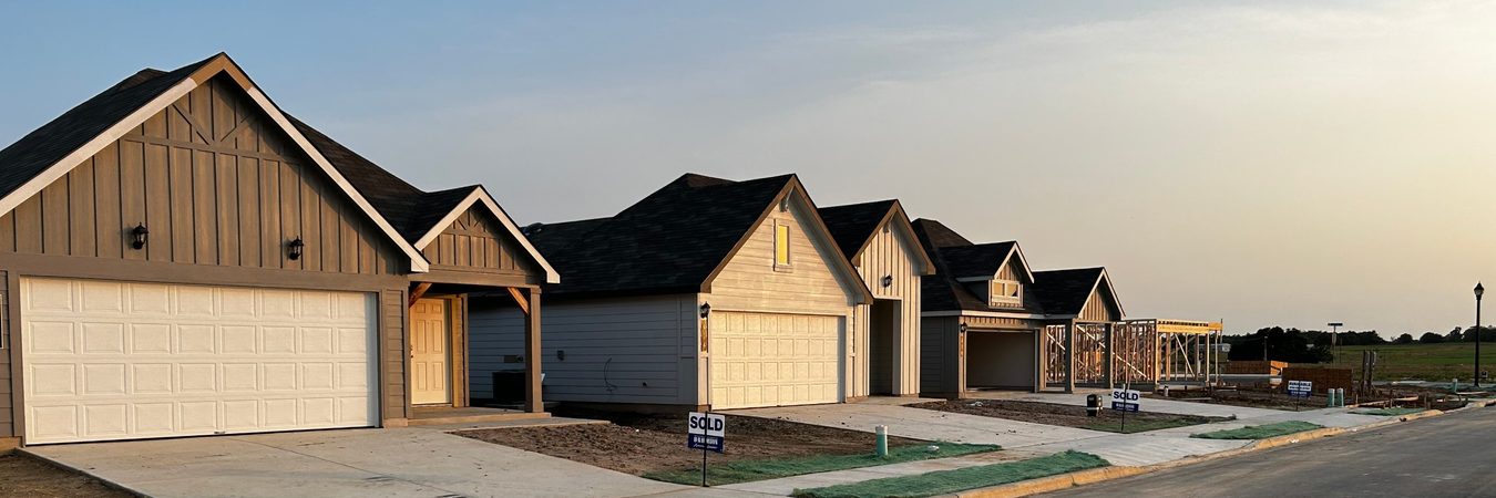 New single-story homes with sold signs and more homes under construction in Cornerstone